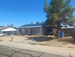 Pre-foreclosure in  W Minnezona Ave Phoenix, AZ 85033