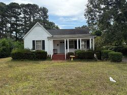 Pre-foreclosure in  N Watauga Ave Dunn, NC 28334