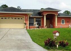 Pre-foreclosure in  TRUMAN AVE Lehigh Acres, FL 33972