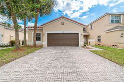 Pre-foreclosure in  NW 36th Ave Pompano Beach, FL 33073