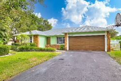 Pre-foreclosure in  NW 108th Ave Pompano Beach, FL 33071