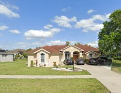 Pre-foreclosure in  Chamonix Ave S Lehigh Acres, FL 33974