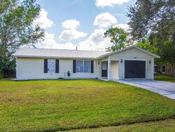 Pre-foreclosure in  SE Faith Ter Port Saint Lucie, FL 34983