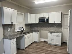 Pre-foreclosure in  Monroe Ave Kansas City, MO 64127