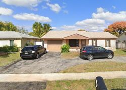 Pre-foreclosure in  Sw 9th Pl Pompano Beach, FL 33068