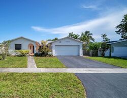 Pre-foreclosure in  Nw 24th Pl Hollywood, FL 33024