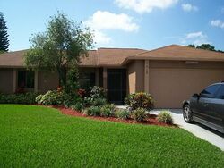 Pre-foreclosure in  SW Estaugh Ave Port Saint Lucie, FL 34953