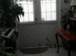 Pre-foreclosure in  W DAFFODIL LN Hollywood, FL 33025