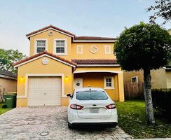 Pre-foreclosure in  SE 14TH CT Homestead, FL 33035