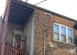 Pre-foreclosure in  S CHAMPLAIN AVE Chicago, IL 60619