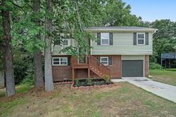 Pre-foreclosure in  ROLLING ROCK DR Conley, GA 30288