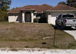 Pre-foreclosure in  Naples Ave S Lehigh Acres, FL 33974