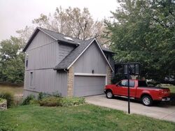 Pre-foreclosure in  Ne Woodridge Dr Lees Summit, MO 64064