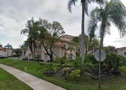 Pre-foreclosure in  PINEWALK DR N Pompano Beach, FL 33063