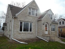 Pre-foreclosure in  E Layton Ave Cudahy, WI 53110