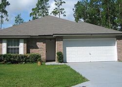 Pre-foreclosure in  Rippling Brook Dr Palm Coast, FL 32164