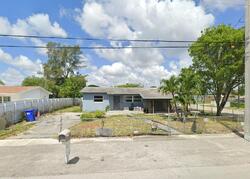 Pre-foreclosure in  NW 23rd Ter Pompano Beach, FL 33069