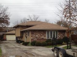 Pre-foreclosure in  RHODES AVE Melrose Park, IL 60164