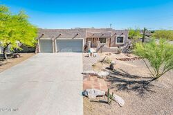Pre-foreclosure in  W RED ROBIN DR Wittmann, AZ 85361