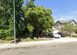 Pre-foreclosure in  N Milburn Ave Fresno, CA 93722