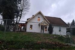 Pre-foreclosure in  S Cushman Ave Tacoma, WA 98408