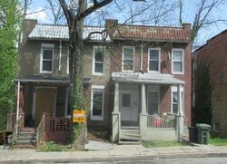 Pre-foreclosure in  COTTAGE AVE Baltimore, MD 21215