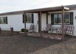 Pre-foreclosure in  S Derby Cir Golden Valley, AZ 86413
