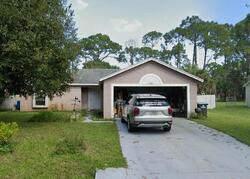 Pre-foreclosure in  Hawkins Ave SW Palm Bay, FL 32908
