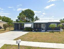 Pre-foreclosure in  NE 13th Ave Pompano Beach, FL 33064