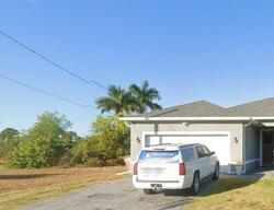 Pre-foreclosure in  NW 24th Pl Cape Coral, FL 33993