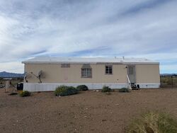 Pre-foreclosure in  W Abrigo Dr Golden Valley, AZ 86413