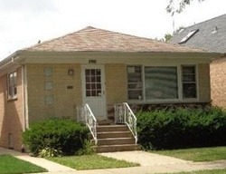 Pre-foreclosure in  N OSAGE AVE Chicago, IL 60634
