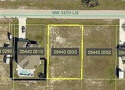 Pre-foreclosure in  NW 34th Ln Cape Coral, FL 33993
