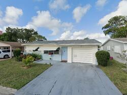 Pre-foreclosure in  NW 69TH AVE Pompano Beach, FL 33063