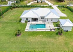 Pre-foreclosure in  74th Ave N Palm Beach Gardens, FL 33418