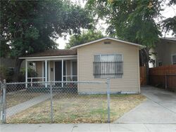 Pre-foreclosure in  E 77th St Los Angeles, CA 90001