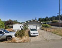 Pre-foreclosure in  E 12th St Coquille, OR 97423