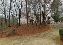 Pre-foreclosure in  Pointe Ridge Dr Atlanta, GA 30328