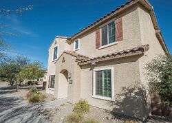 Pre-foreclosure in  E Midnight Moon Ln Tucson, AZ 85747