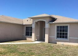 Pre-foreclosure in  NW 9th Pl Cape Coral, FL 33993