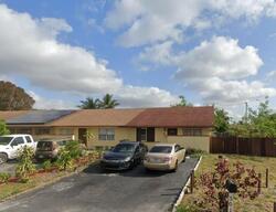 Pre-foreclosure in  NW 43rd Pl Pompano Beach, FL 33064