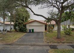 Pre-foreclosure in  NW 123rd Ave Pompano Beach, FL 33065