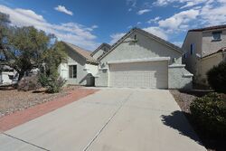 Pre-foreclosure in  N Blue Crossing Way Tucson, AZ 85743