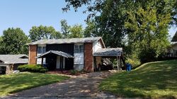 Pre-foreclosure in  Leigh Ln Maryland Heights, MO 63043