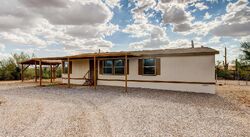 Pre-foreclosure in  N Sandario Rd Tucson, AZ 85743