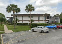 Pre-foreclosure in  Greenway Vlg N Unit 107 West Palm Beach, FL 33411