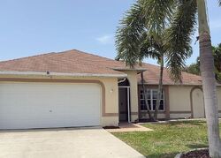 Pre-foreclosure in  Nw 25th St Cape Coral, FL 33993