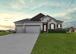 Pre-foreclosure in  Nw 32nd Ct Cape Coral, FL 33993