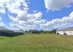 Pre-foreclosure in  Ne 2nd Pl Cape Coral, FL 33909