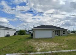 Pre-foreclosure in  Ne 19th Pl Cape Coral, FL 33909